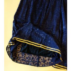Dark blue floral material palazzo pant with gold stripes at the end