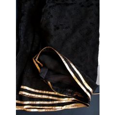 Dimond pattern black palazzo pant with gold stripes at the end